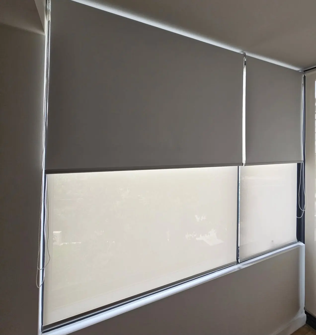 Roller blind fitted at a window – Quinton Blinds