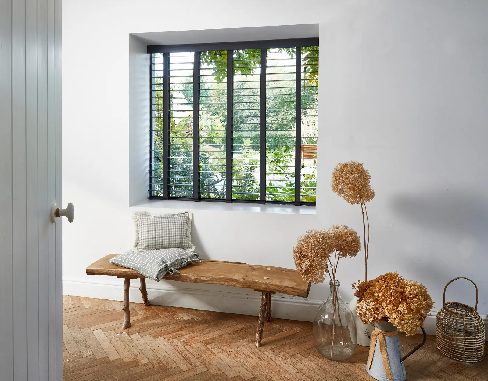 Faux wood slat blinds at a window – Quinton Blinds